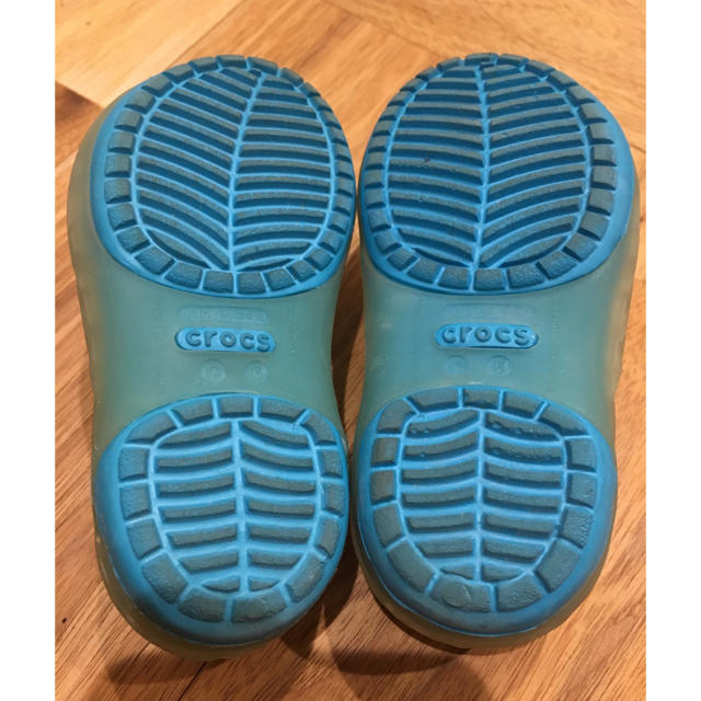 crocs(クロックス)の☆Mel様専用☆水色 ガラスの靴 パンプス サンダル キッズ/ベビー/マタニティのベビー靴/シューズ(~14cm)(フラットシューズ)の商品写真