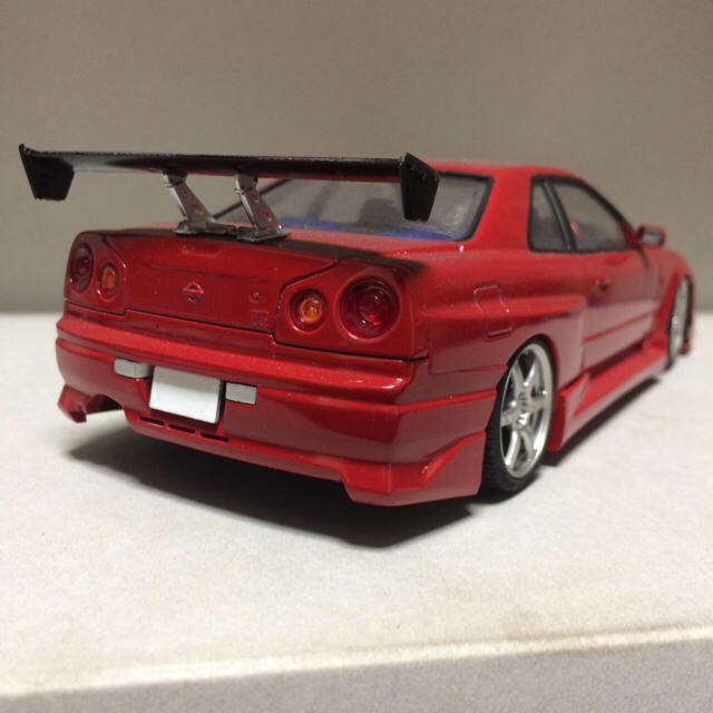 AOSHIMA(アオシマ)の1/24 アオシマ スカイライン R34 GT-R C-WEST エンタメ/ホビーのおもちゃ/ぬいぐるみ(プラモデル)の商品写真