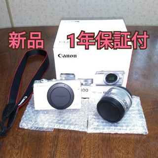 キヤノン(Canon)の新品✨3/23購入☆EOS M100ホワイト+標準ズームレンズ☆一年保証付き(ミラーレス一眼)