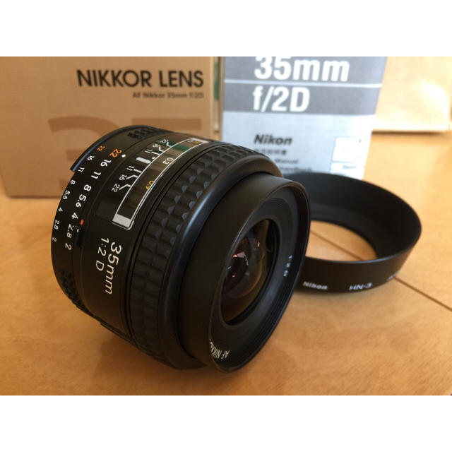 Nikon(ニコン)のNikon AF Nikkor 35mm f/2D フード PLフィルター付き スマホ/家電/カメラのカメラ(レンズ(単焦点))の商品写真