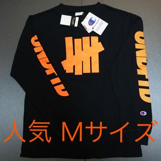 アンディフィーテッド(UNDEFEATED)のM UNDEFEATED CHAMPION LOGO Tee UNDFTD T(Tシャツ/カットソー(七分/長袖))