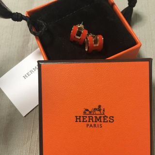 エルメス(Hermes)のエルメスピアスオレンジ×ＰＧ(ピアス)