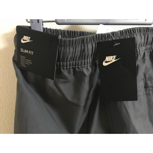 NIKE(ナイキ)のNIKE ナイキ ジョガー プレーヤーズ ウーブン パンツ メンズのパンツ(サルエルパンツ)の商品写真