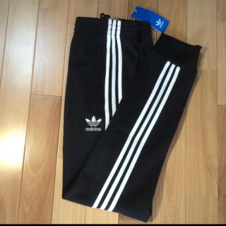 アディダス(adidas)の最安 adidas sst cuffed track pants(その他)