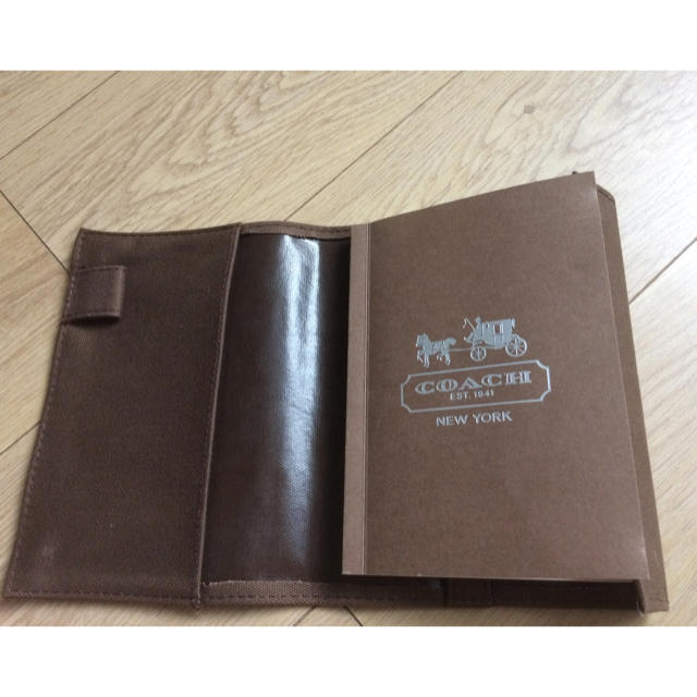 COACH(コーチ)の新品 送料込み COACH 手帳 ブックカバー  ハンドメイドの文具/ステーショナリー(ブックカバー)の商品写真