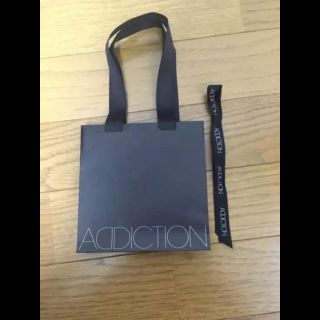 アディクション(ADDICTION)のアディクション 紙袋 リボン付き(ショップ袋)