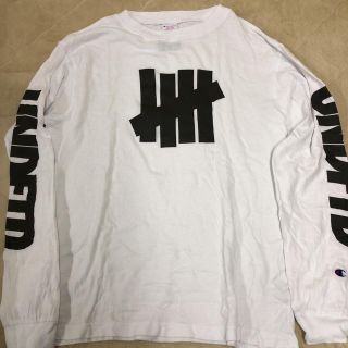 アンディフィーテッド(UNDEFEATED)のUNDEFEATED champion ロングTシャツ(Tシャツ/カットソー(七分/長袖))