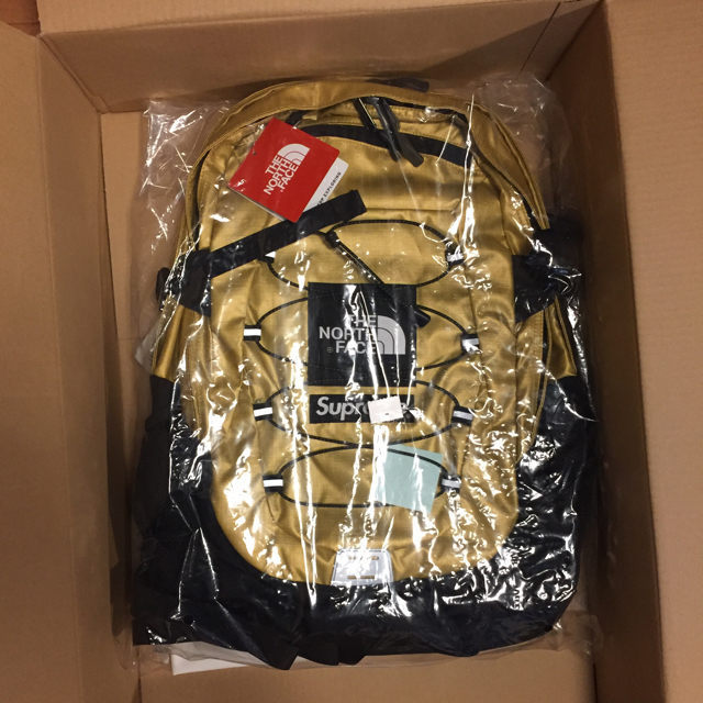 オンライン Supreme Supreme The North Backpack ゴールドの通販 by