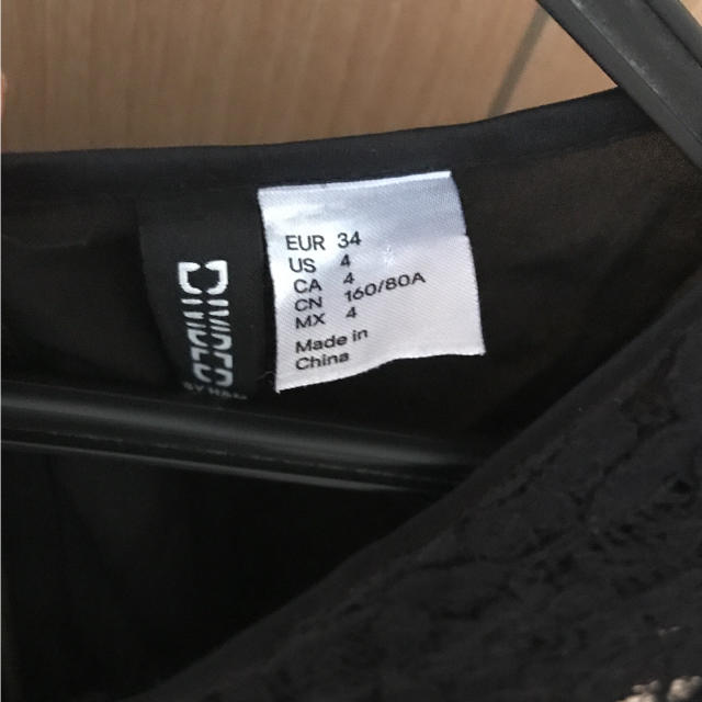 H&M(エイチアンドエム)の黒レーストップス レディースのトップス(カットソー(半袖/袖なし))の商品写真
