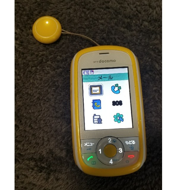 NTTdocomo(エヌティティドコモ)の【中古品】キッズケータイ HW-01D イエロー スマホ/家電/カメラのスマートフォン/携帯電話(携帯電話本体)の商品写真