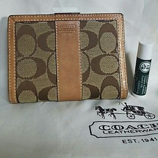 コーチ(COACH)のCOACH コーチ レザー キャンバス がま口 シグネチャー  折り財布 105(財布)