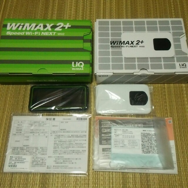 NEC(エヌイーシー)の(新品)WIMAX２台ぶん【W０２緑・WX０２白】 スマホ/家電/カメラのスマートフォン/携帯電話(その他)の商品写真