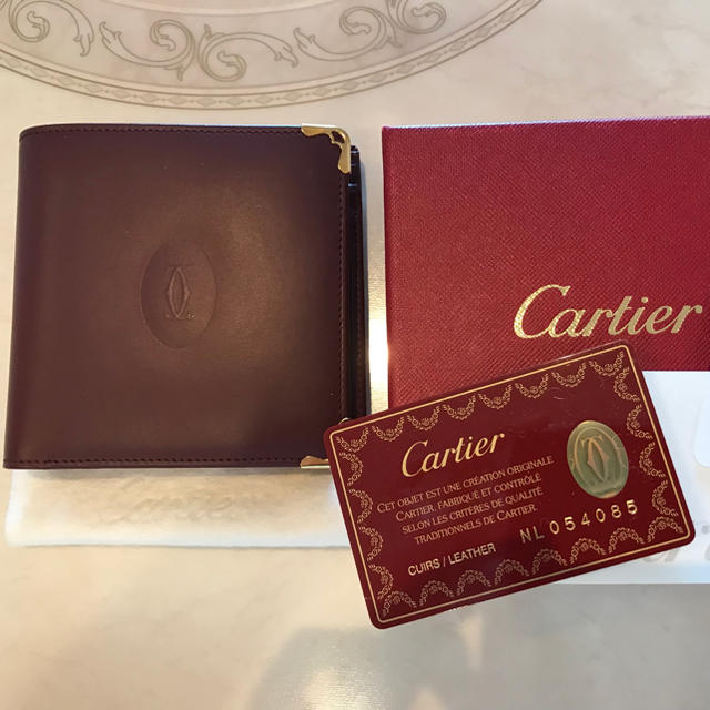 Cartier(カルティエ)のカルティエ  二つ折り 財布 ボルドー　マストライン レディースのファッション小物(財布)の商品写真