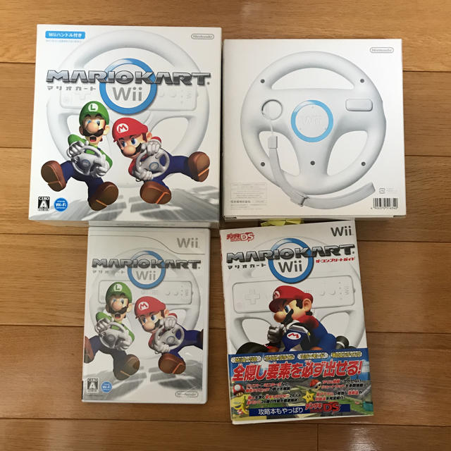 Wii マリオカート Wii ハンドル２本 攻略本付の通販 By ツインバード S Shop ウィーならラクマ