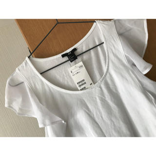 エイチアンドエム(H&M)のフリルTシャツ(Tシャツ(半袖/袖なし))