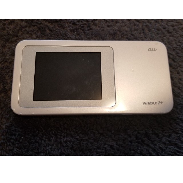 au(エーユー)の【中古品】WiFiルーター W01 ホワイト/白 本体のみ スマホ/家電/カメラのPC/タブレット(PC周辺機器)の商品写真