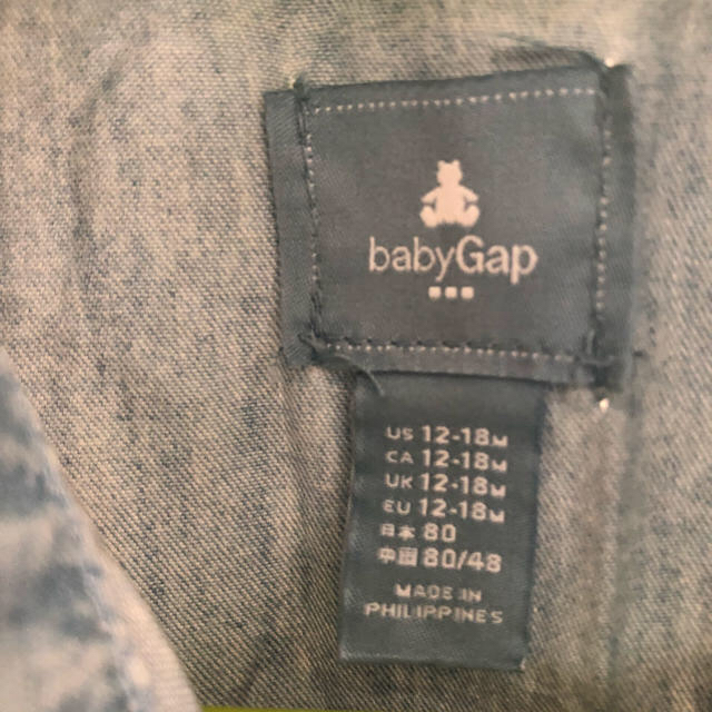 babyGAP(ベビーギャップ)のbaby GAP フリル デニムワンピース  80㎝ キッズ/ベビー/マタニティのベビー服(~85cm)(ワンピース)の商品写真