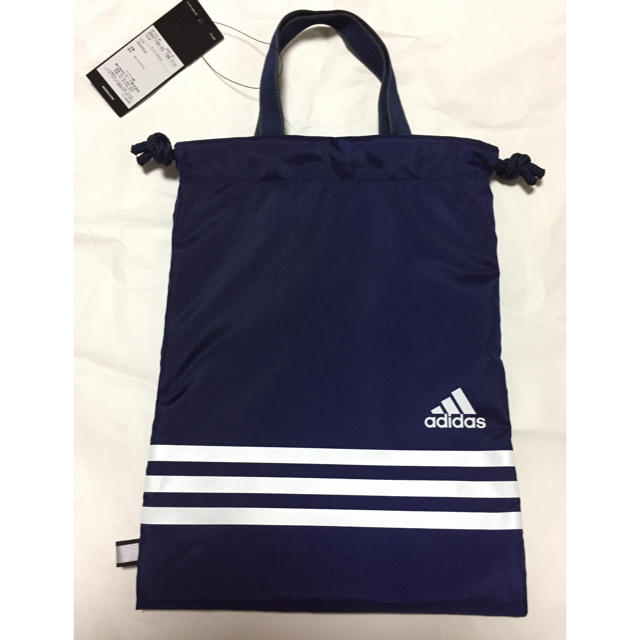 adidas(アディダス)の【新品】アディダス　巾着型　シューズケース　紺 キッズ/ベビー/マタニティのこども用バッグ(シューズバッグ)の商品写真