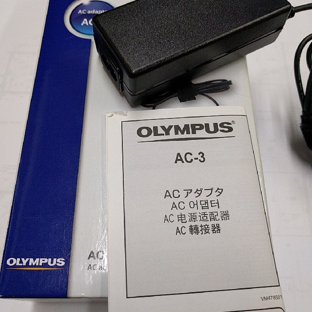 OLYMPUS(オリンパス)のOMD-ＥＭ−1用AC アダプター　AC-3 スマホ/家電/カメラのスマートフォン/携帯電話(バッテリー/充電器)の商品写真