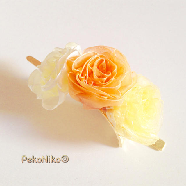 ラッピング無料☆オーガンジーリボンの薔薇 マジェステ 夏みかんオレンジ ハンドメイドのアクセサリー(ヘアアクセサリー)の商品写真