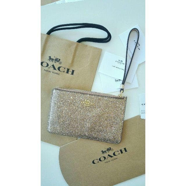 COACH(コーチ)の★★交渉中★★COACHゴールド星スターギラギララメ姫ストラップポーチ携帯 レディースのファッション小物(ポーチ)の商品写真