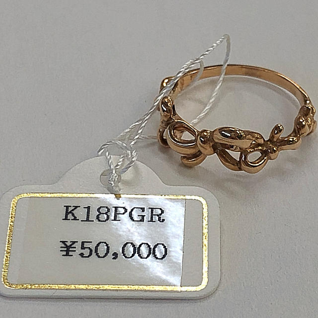 ［本物・新品未使用］k18PG リボンモチーフ ９号 リング レディースのアクセサリー(リング(指輪))の商品写真