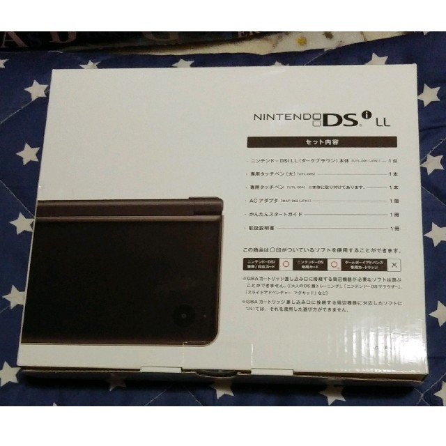 ニンテンドーDS(ニンテンドーDS)の新品未使用☆DS i LL☆ダークブラウン☆初期モデル エンタメ/ホビーのゲームソフト/ゲーム機本体(携帯用ゲーム機本体)の商品写真