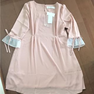 トッコ(tocco)のtocco トッコ 新品 ワンピース ピンク フレア袖 さえこさん リボン(ひざ丈ワンピース)