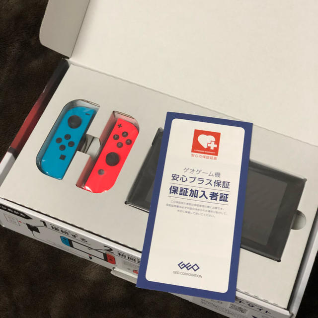 未使用品【Nintendo Switch本体 有機ELモデル】防指紋/ニンテンドースイッチ/店舗印/保証書あり/白色（N0302） 