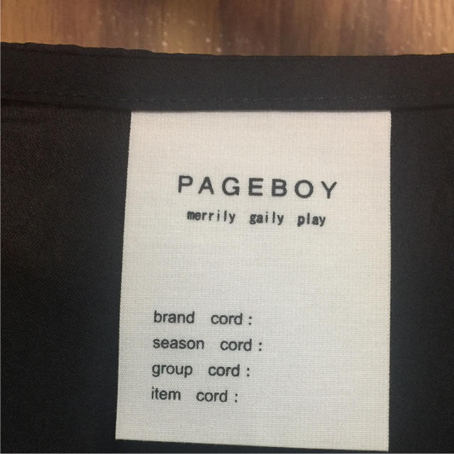 PAGEBOY(ページボーイ)のペジーボーイ おリボンブラックチュニック レディースのトップス(チュニック)の商品写真