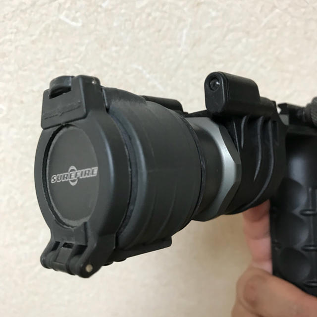 SUREFIRE(シュアファイア)のSUREFIRE M900A 実物 Tip Off Filter おまけ エンタメ/ホビーのミリタリー(その他)の商品写真