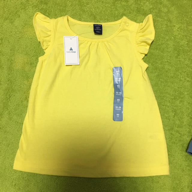 babyGAP(ベビーギャップ)のbaby gap 黄色 トップス 80 キッズ/ベビー/マタニティのベビー服(~85cm)(Ｔシャツ)の商品写真