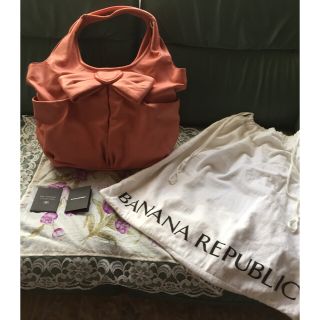 バナナリパブリック(Banana Republic)のバナナリパブリックのトートバッグ リボン ピンクオレンジ 本革(トートバッグ)