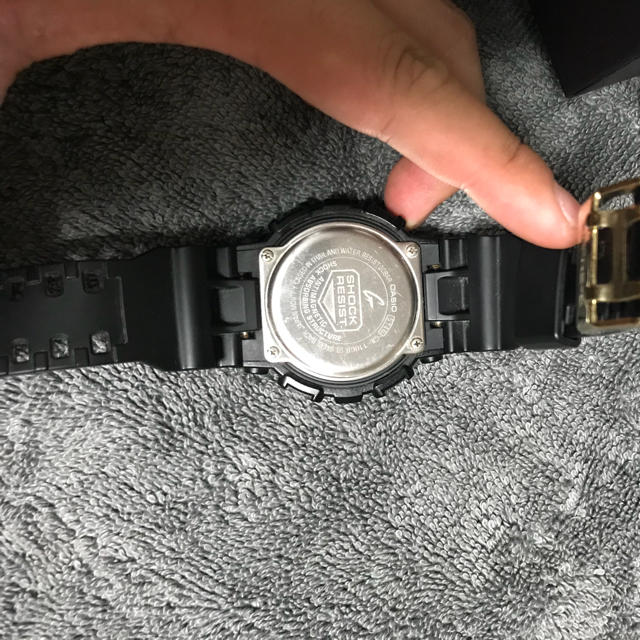 G-SHOCK(ジーショック)のG-SHOCK ブラック ゴールド メンズの時計(腕時計(デジタル))の商品写真