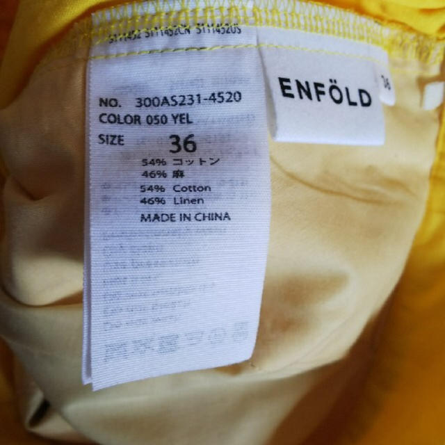 ENFOLD(エンフォルド)のエンフォルド アシンメトリーデザインパンツ イエロー36 レディースのパンツ(カジュアルパンツ)の商品写真
