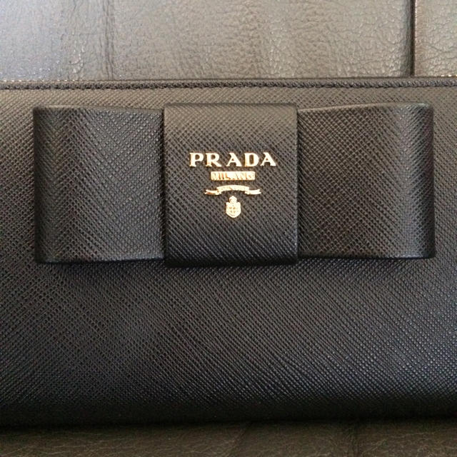 PRADA - 新品未使用 プラダラウンドジップ リボン折長財布 黒 ブラック