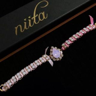 ティンクピンク(tinkpink)のniita ニータ スワロフスキーブレスレット ピンク 新品(ブレスレット/バングル)