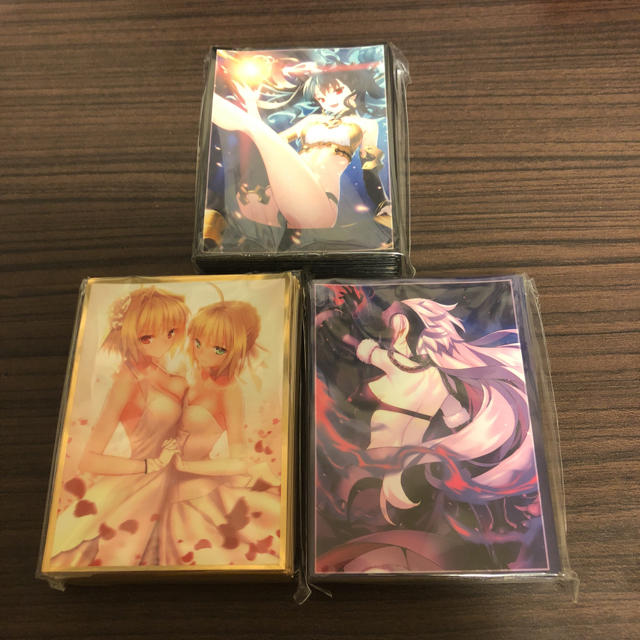 コミケ Fate セイバー 花嫁 FGO スリーブ デッキケース セット エンタメ/ホビーのトレーディングカード(カードサプライ/アクセサリ)の商品写真