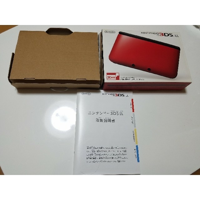 ニンテンドー3DS(ニンテンドー3DS)のゴリラ様　専用　3DS LL レッド×ブラック　空き箱　説明書 エンタメ/ホビーのエンタメ その他(その他)の商品写真