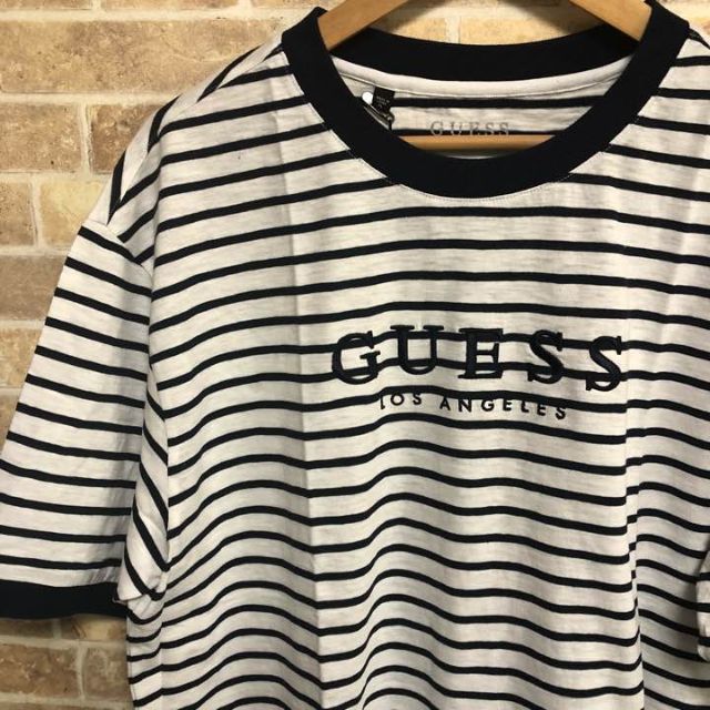 GUESS(ゲス)の新品未使用 GUESS ボーダーロゴTシャツ ブラック Lサイズ  メンズのトップス(Tシャツ/カットソー(半袖/袖なし))の商品写真