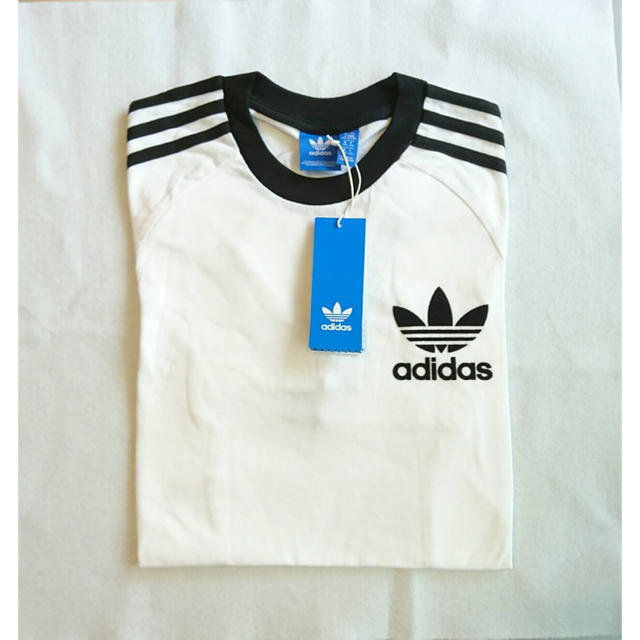 adidas(アディダス)の新品 ホワイト Lサイズ adidas★ カリフォルニアTシャツ ユニセックス メンズのトップス(Tシャツ/カットソー(半袖/袖なし))の商品写真