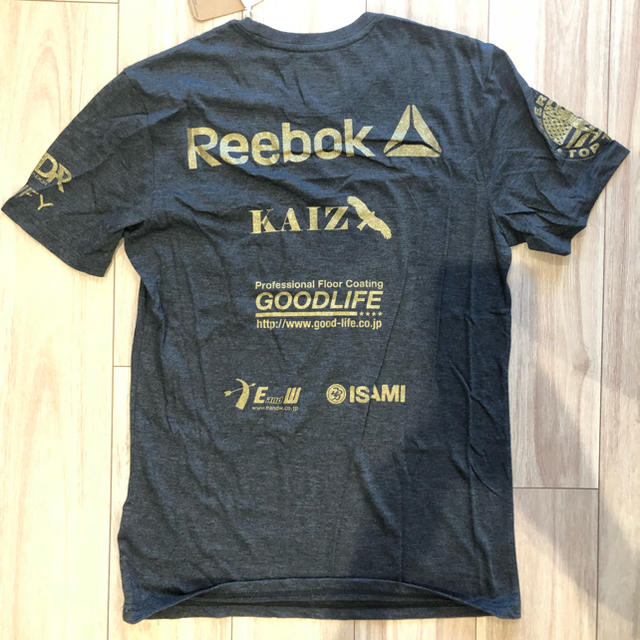 Reebok(リーボック)の新品未使用/ 堀口恭司 RIZINチャンピオンウォークイン Tシャツ メンズのトップス(Tシャツ/カットソー(半袖/袖なし))の商品写真