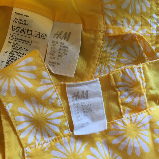 H&M(エイチアンドエム)のH&M黄色のベビーワンピース ロンパース80 キッズ/ベビー/マタニティのベビー服(~85cm)(ワンピース)の商品写真