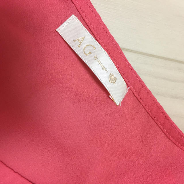 AG by aquagirl(エージーバイアクアガール)のピンク袖フリルシャツAGbyaquagirl レディースのトップス(シャツ/ブラウス(半袖/袖なし))の商品写真