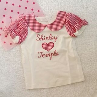 シャーリーテンプル(Shirley Temple)の新品　今季　シャーリーテンプル　赤ギンガム　Ｔシャツ　100(Tシャツ/カットソー)