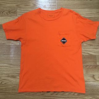 エフシーアールビー(F.C.R.B.)のFCRB ポケット背面デカロゴ M(Tシャツ/カットソー(半袖/袖なし))