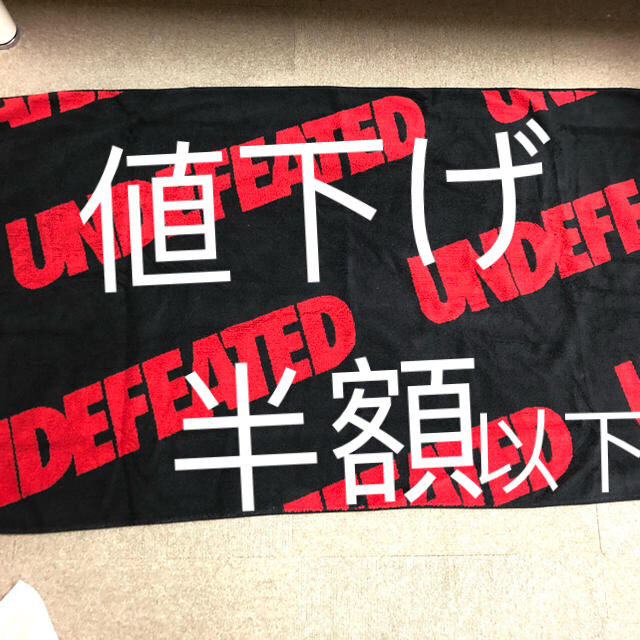 UNDEFEATED(アンディフィーテッド)のUNDEFEATED ビーチタオル インテリア/住まい/日用品の日用品/生活雑貨/旅行(タオル/バス用品)の商品写真