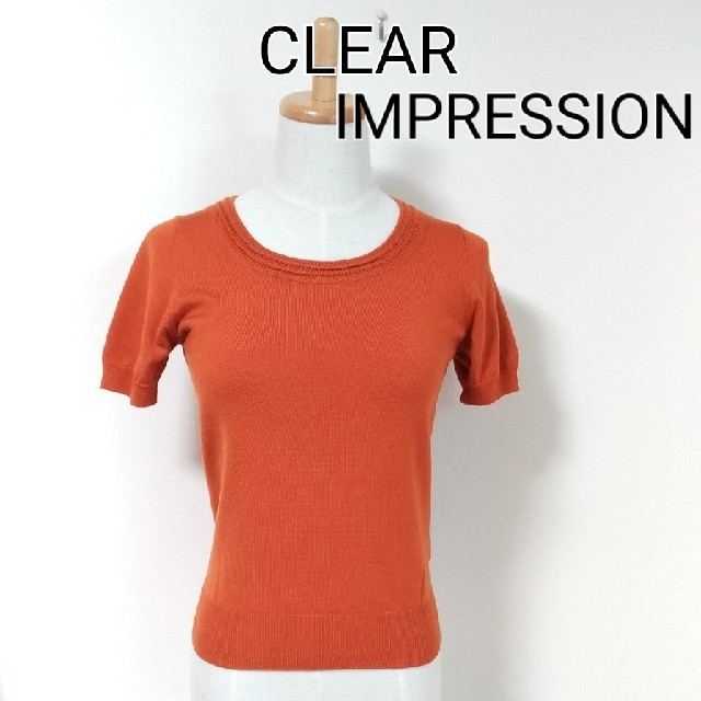 CLEAR IMPRESSION(クリアインプレッション)のCLEAR IMPRESSION　オレンジ　半袖ニット　ラインが綺麗です レディースのトップス(ニット/セーター)の商品写真