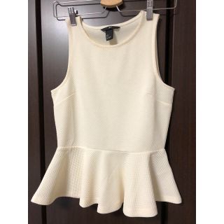 エイチアンドエム(H&M)のペプラムトップス(カットソー(半袖/袖なし))