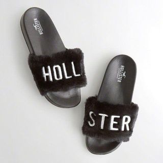 ホリスター(Hollister)の★新品★ホリスター★フェイクファースライドサンダル (Black/XS)(サンダル)